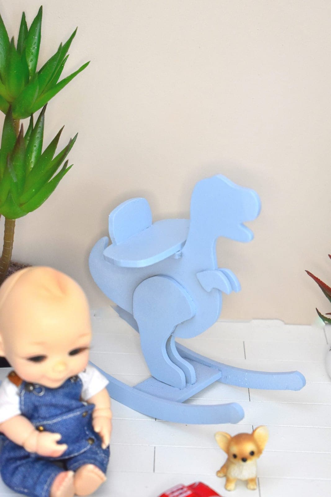 Dinosaure à bascule 1/8